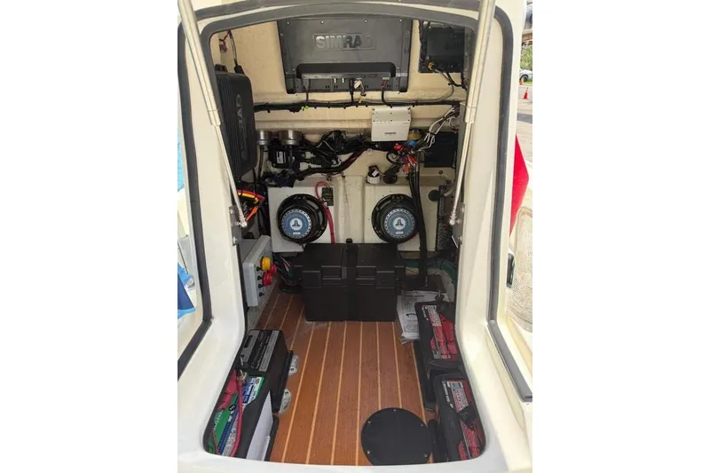 Slide: The Image of Interior view of 2017 Yellowfin 24 Bay CE boat's electrical and mechanical systems. - 12
