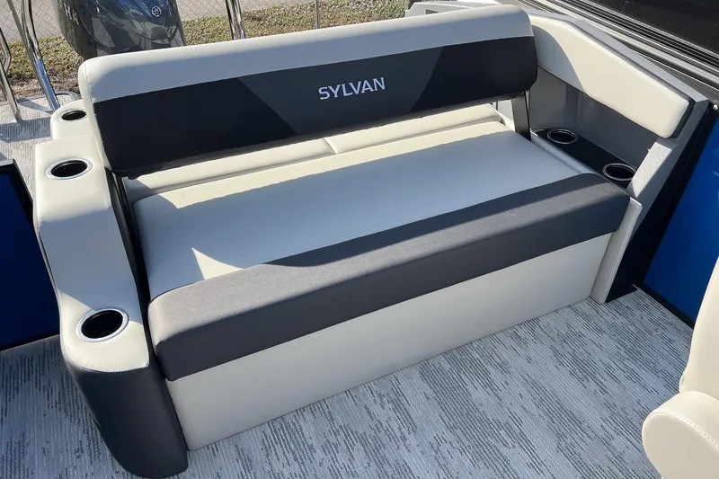 Slide: The Image of 2026 Sylvan R22 LZ DH boat seating with cup holders, featuring sleek design and comfortable upholstery. - 16