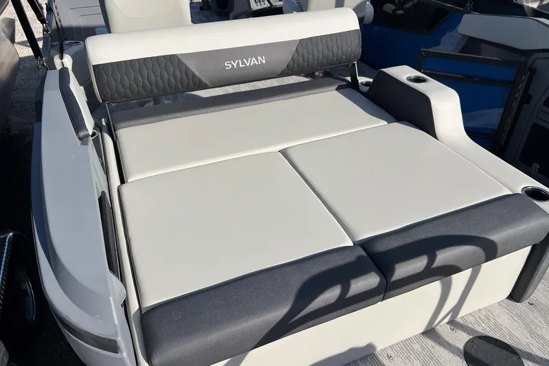Slide: The Image of 2026 Sylvan R22 LZ DH boat with cushioned seating and cup holders. - 19