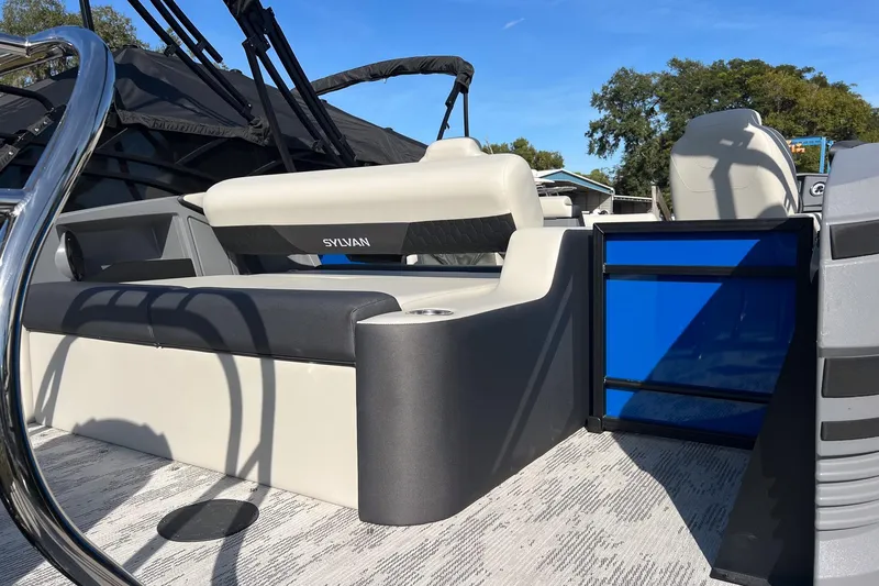 Slide: The Image of 2026 Sylvan R22 LZ DH boat interior with modern seating and sleek design. - 3