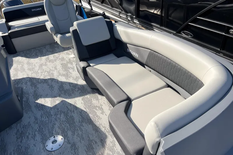 Slide: The Image of 2026 Sylvan R22 LZ DH boat interior with gray seating and modern design. - 7