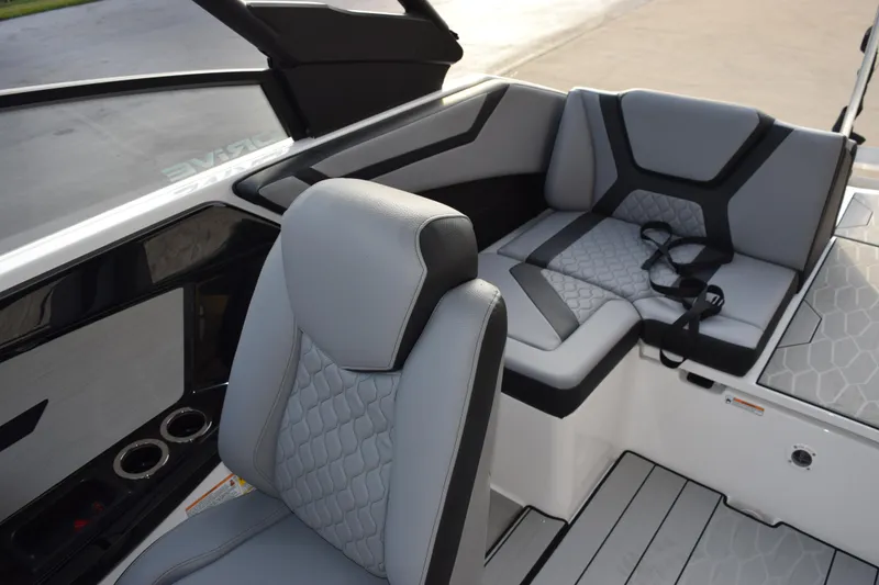 Slide: The Image of 2026 Yamaha Boats 222XD interior with modern gray seating and sleek design. - 10