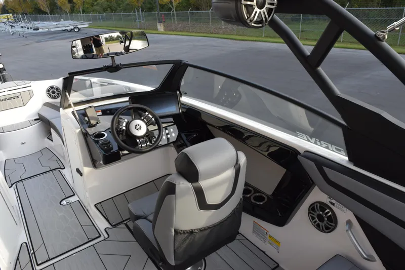 Slide: The Image of 2026 Yamaha Boats 222XD cockpit with modern steering and dashboard design. - 8