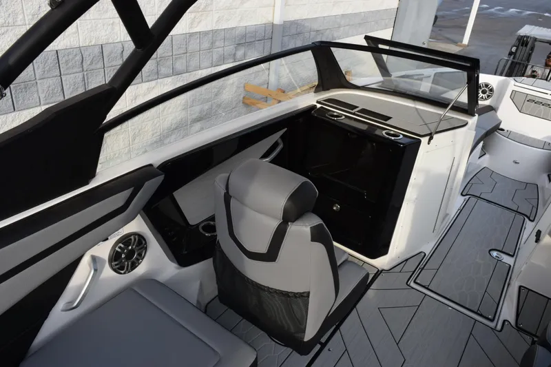 Slide: The Image of 2026 Yamaha Boats 222XD interior with sleek seating and modern dashboard design. - 9