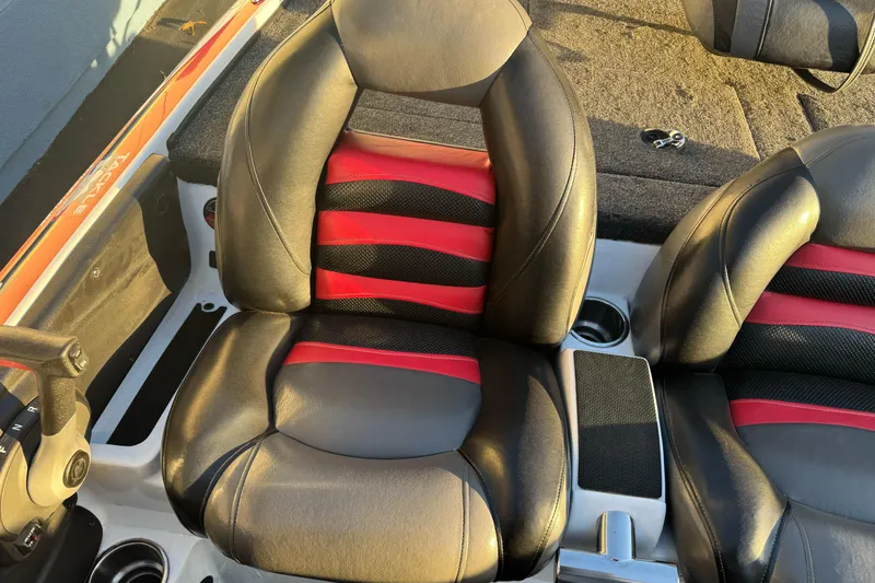Slide: The Image of 2011 Nitro Z-9 DC boat seats with black and red leather design. - 14