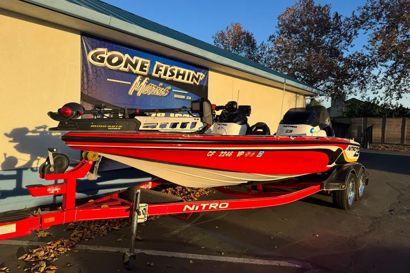 Slide: The Image of 2011 Nitro Z-9 DC boat on trailer, parked outside Gone Fishin' Marine. - 2
