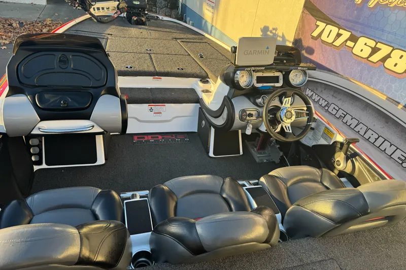 Slide: The Image of 2011 Nitro Z-9 DC boat interior with Garmin GPS and leather seating. - 8