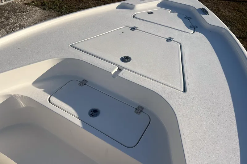 Slide: The Image of 2026 Key West 188 Bay Reef boat deck with storage compartments. - 14