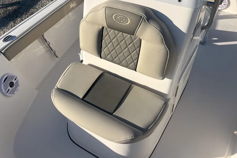 Slide: The Image of 2026 Key West 188 Bay Reef boat seat with quilted design and KW logo. - 15