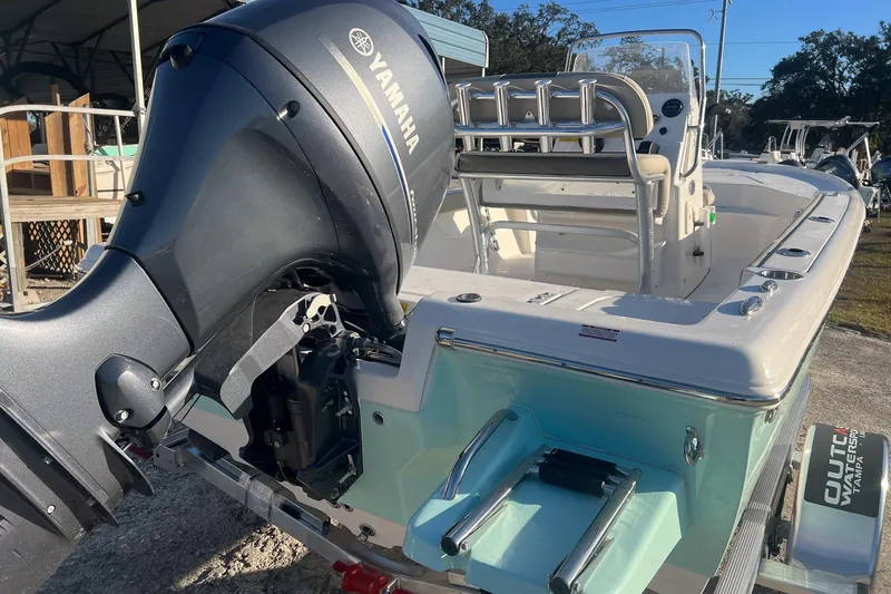 Slide: The Image of 2026 Key West 188 Bay Reef boat with Yamaha outboard motor, docked outdoors. - 5
