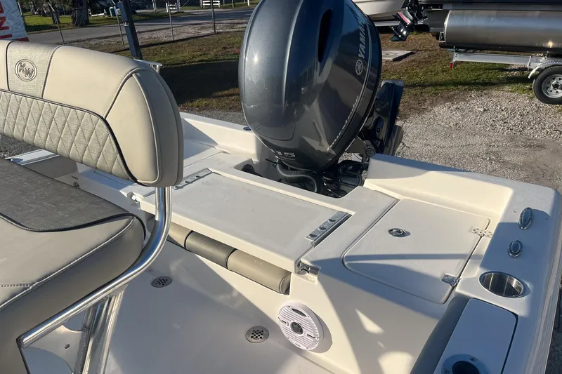 Slide: The Image of 2026 Key West 188 Bay Reef boat with Yamaha outboard motor and cushioned seating. - 7