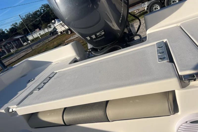 Slide: The Image of 2026 Key West 188 Bay Reef boat with Yamaha 115 engine, outdoor setting. - 8