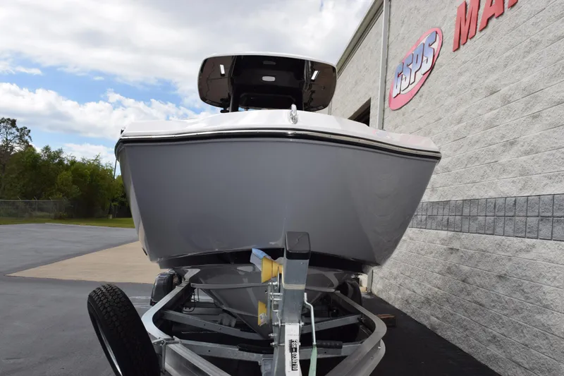 Slide: The Image of 2026 Yamaha Boats 255 FSH Sport H on trailer, front view, outdoors. - 3