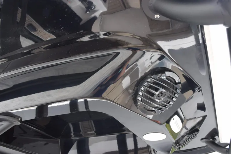 Slide: The Image of 2026 Yamaha Boats 255 FSH Sport H, sleek black exterior detail. - 8