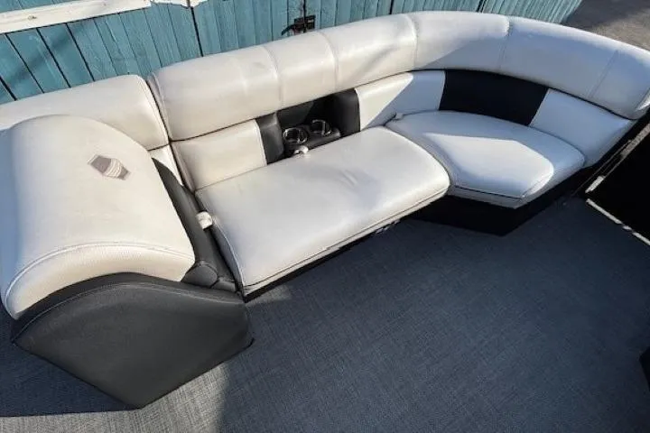 Slide: The Image of Luxurious seating on 2016 Southbay 523CR Super Sport Tri-Toon boat, featuring plush upholstery. - 11