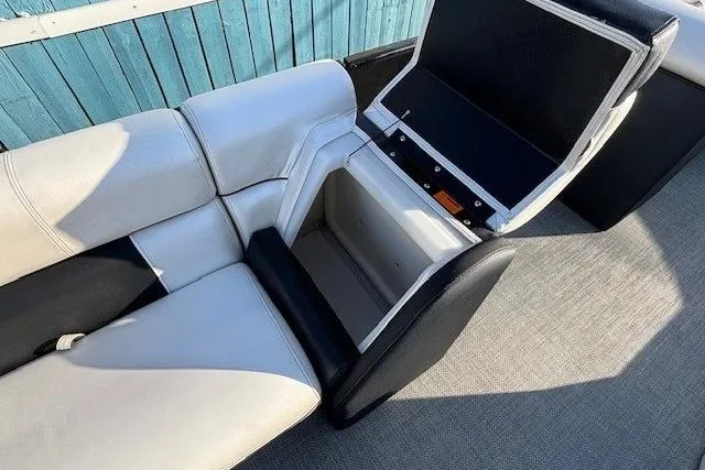 Slide: The Image of 2016 Southbay 523CR Super Sport Tri-Toon boat seat with open storage compartment. - 25