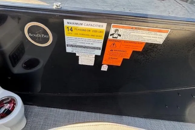 Slide: The Image of 2016 Southbay 523CR Super Sport Tri-Toon capacity label, maximum 14 persons or 2120 lbs. - 26