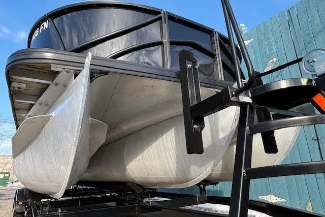 Slide: The Image of 2016 Southbay 523CR Super Sport Tri-Toon boat on trailer, viewed from below. - 3