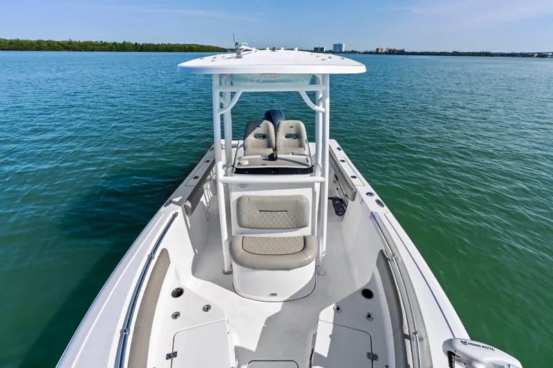 Slide: The Image of 2021 Sportsman Open 212 Center Console boat on calm water. - 10