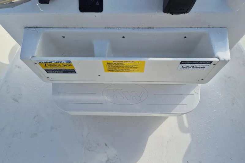 Slide: The Image of Key West 189 FS boat console with capacity and emission labels, 2026 model. - 11