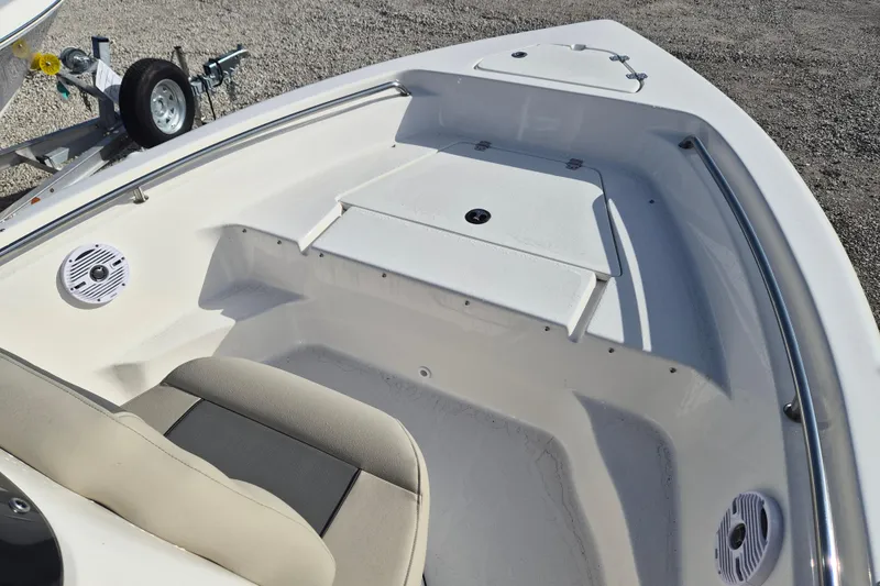 Slide: The Image of 2026 Key West 189 FS boat interior with seating and storage compartments. - 13