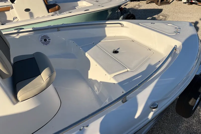 Slide: The Image of 2026 Key West 189 FS boat with Yamaha 115 engine, featuring cushioned seating and cup holders. - 3