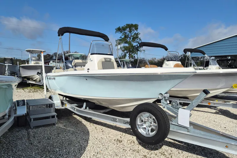 The Image of 2026 Key West 189 FS boat on trailer, displayed outdoors under clear sky. - 5