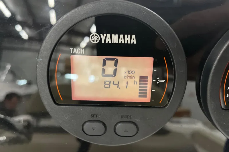 Slide: The Image of Yamaha tachometer displaying 84.1 hours on a 2021 22 Tidewater Adventure boat. - 6