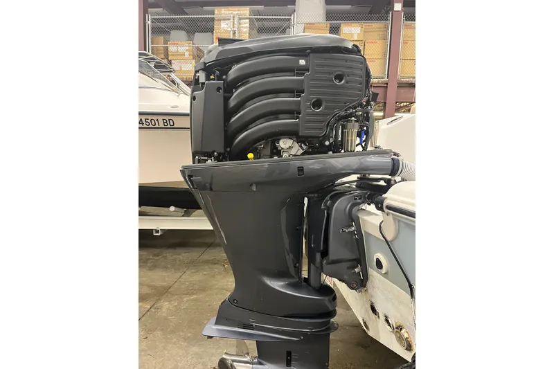 Slide: The Image of 2021 22 Tidewater Adventure boat engine in a storage facility. - 9