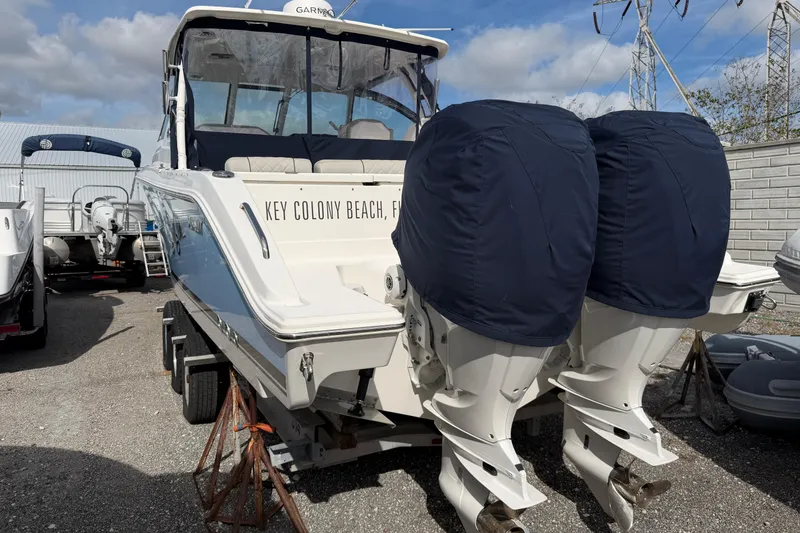 Slide: The Image of 2023 Pursuit DC 295 Dual Console boat with covered engines, Key Colony Beach, Florida. - 14