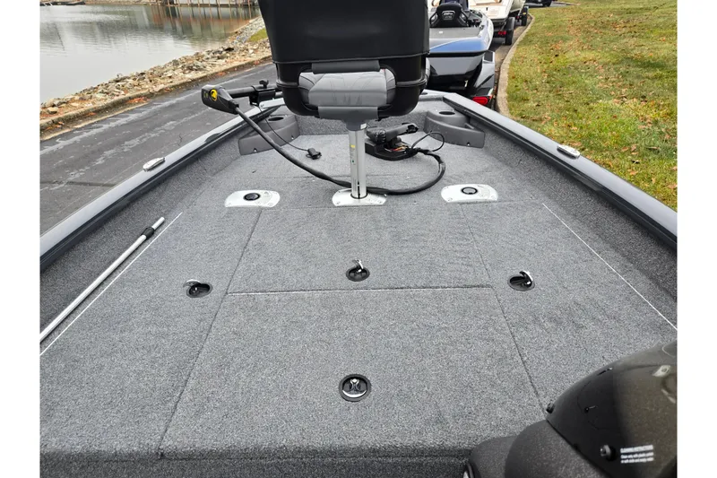 Slide: The Image of 2022 Tracker Pro Team 175 TF boat interior with fishing seat and trolling motor. - 15