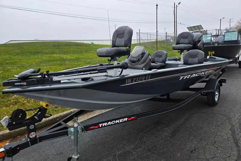 Slide: The Image of 2022 Tracker Pro Team 175 TF fishing boat on trailer, parked outdoors. - 6
