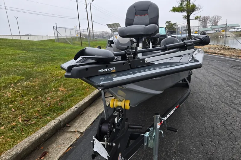 Slide: The Image of 2022 Tracker Pro Team 175 TF boat with Minn Kota trolling motor on a trailer. - 7