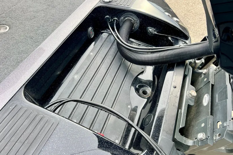 Slide: The Image of 2017 Ranger Z519 boat compartment with cables and wiring visible. - 11