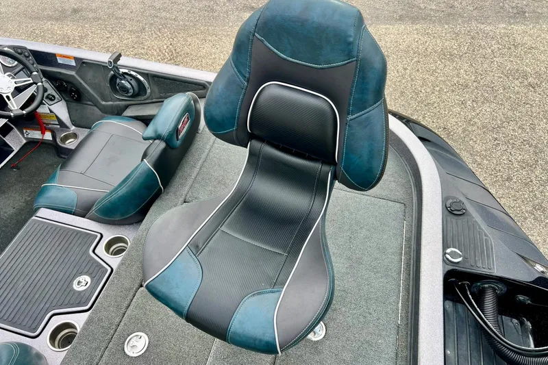 Slide: The Image of 2017 Ranger Z519 boat interior with sleek, cushioned seating and modern dashboard design. - 25