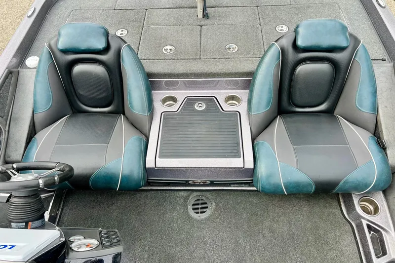 Slide: The Image of 2017 Ranger Z519 boat interior with dual seats and steering wheel. - 26