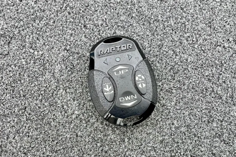 Slide: The Image of Remote control for 2017 Ranger Z519 boat on textured surface. - 29