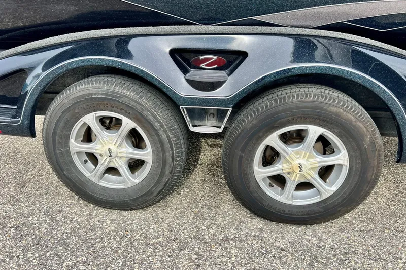 Slide: The Image of 2017 Ranger Z519 trailer with dual wheels on asphalt surface. - 8