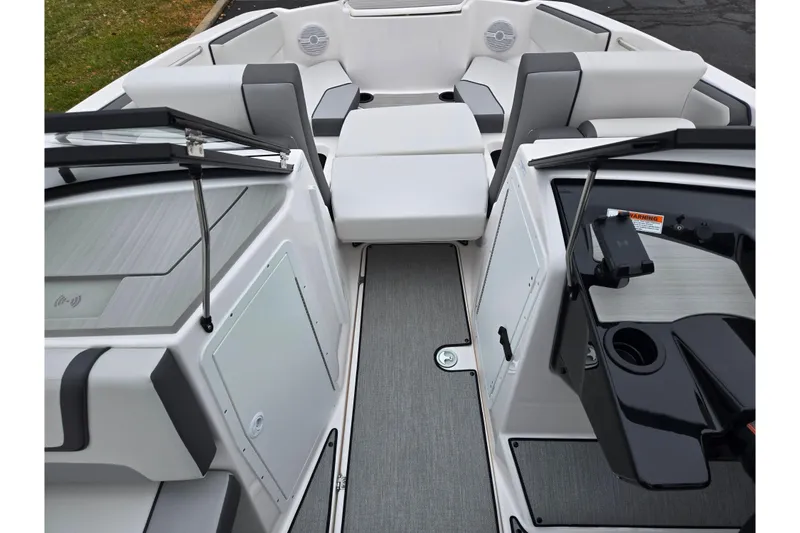 Slide: The Image of 2025 Yamaha Boats AR220 interior with sleek seating and modern design. - 15