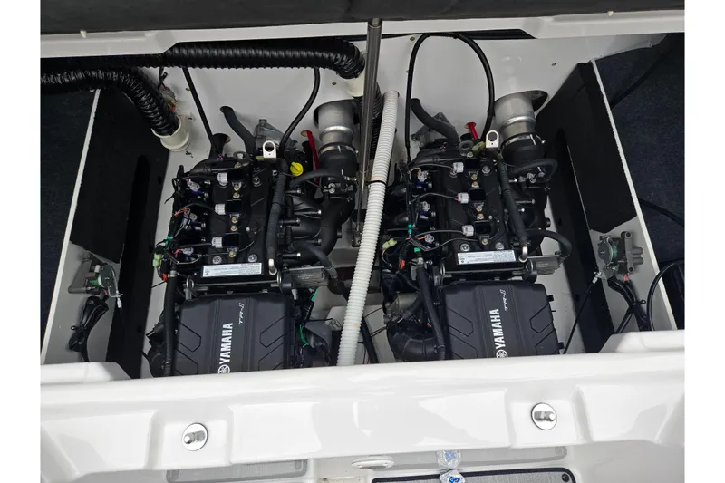Slide: The Image of 2025 Yamaha Boats AR220 engine compartment showcasing dual engines and components. - 26