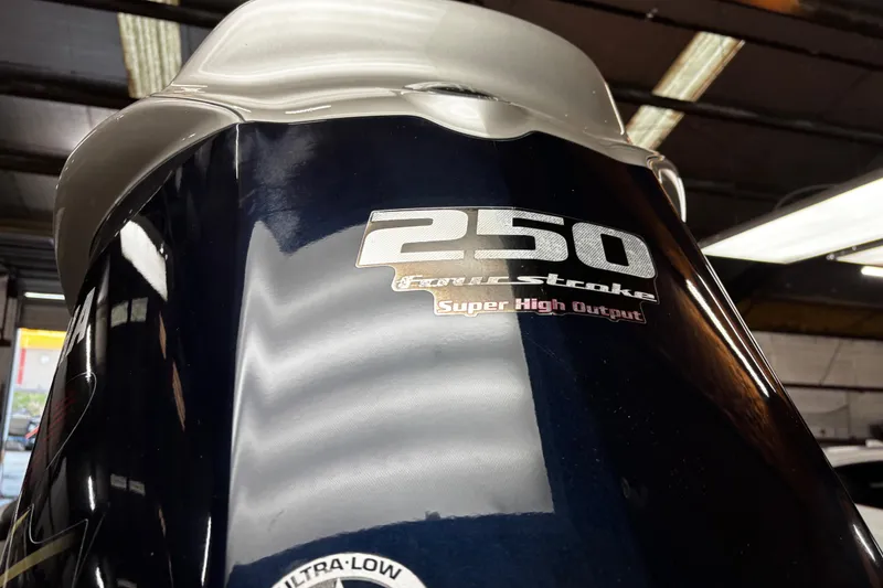 Slide: The Image of 2014 Skeeter ZX20 boat with Yamaha VMAX engine on trailer, parked outdoors. - 16