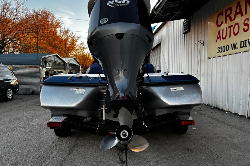 Slide: The Image of 2014 Skeeter ZX20 boat interior with dual seats and steering console. - 30