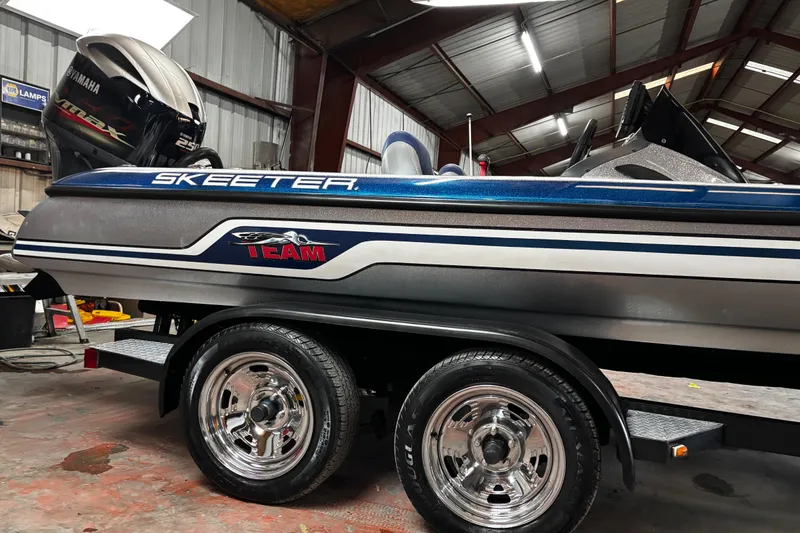 Slide: The Image of 2014 Skeeter ZX20 boat with Yamaha VMAX engine on a trailer. - 7