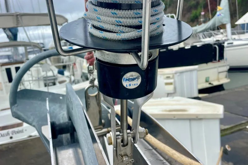 Slide: The Image of Close-up of a 2020 Beneteau Oceanis 38.1 sailboat's rigging system at a marina. - 15