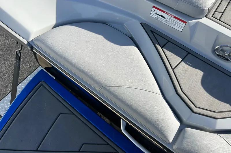 Slide: The Image of 2017 Tigé R21 boat interior with sleek seating and modern design elements. - 18