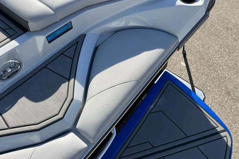 Slide: The Image of 2017 Tigé R21 boat interior with TAPS 3 system, featuring sleek seating and deck design. - 20