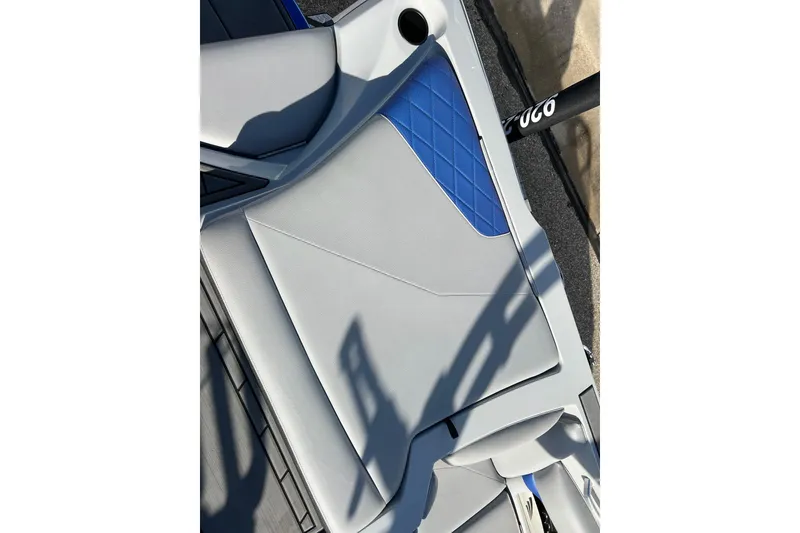 Slide: The Image of 2017 Tigé R21 boat seat with blue and gray upholstery design. - 22