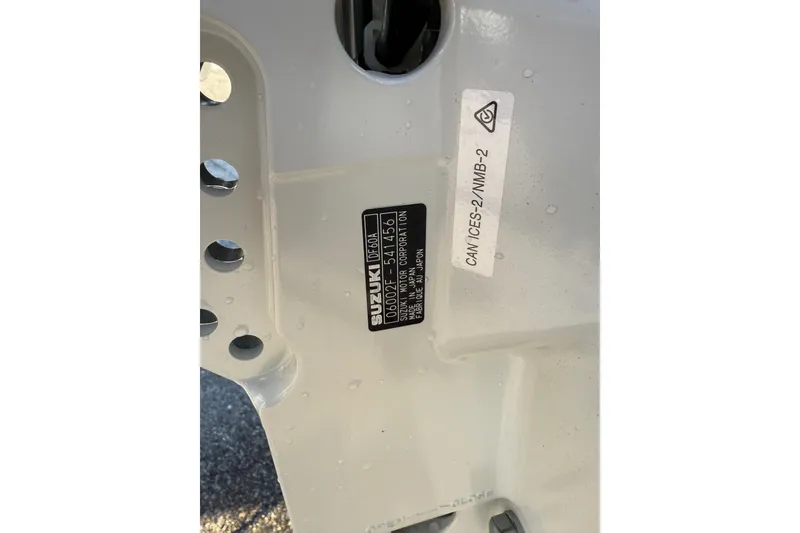 Slide: The Image of Close-up of a 2026 Carolina Skiff E16 JVX CC boat engine label. - 26