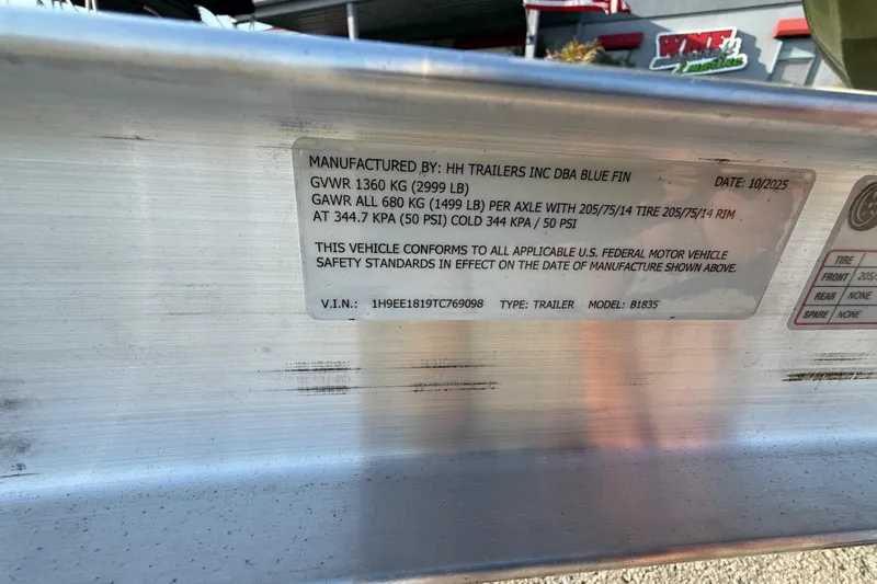 Slide: The Image of Label on trailer manufactured by HH Trailers, detailing specifications and compliance, dated October 2025. - 24