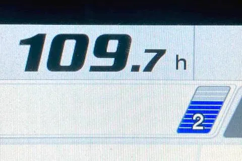 Slide: The Image of Digital display showing 109.7 hours on a 2018 Ranger Tugs R-27. - 27